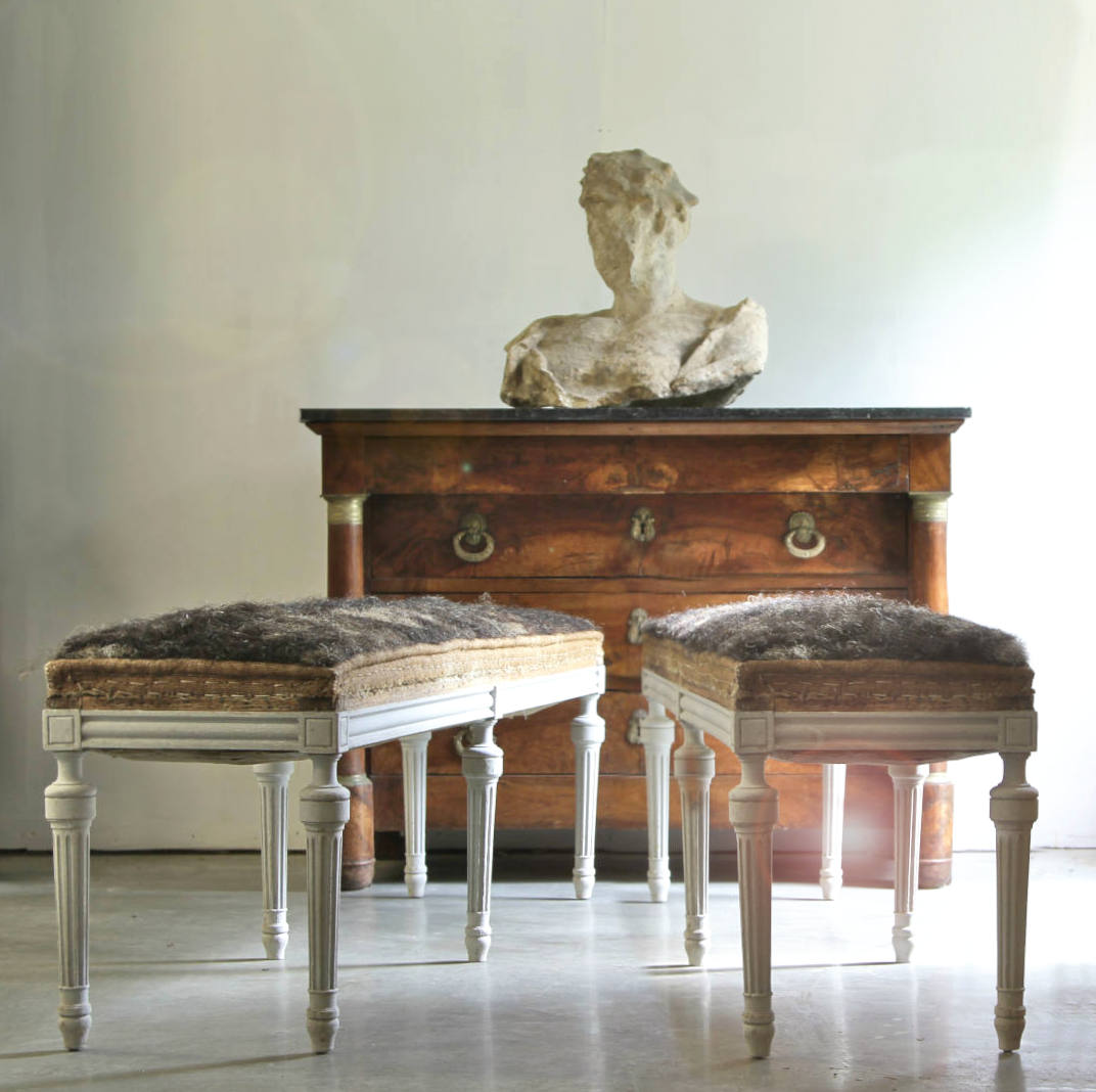 A pair of antique benches with Louis Philippe reeded leg