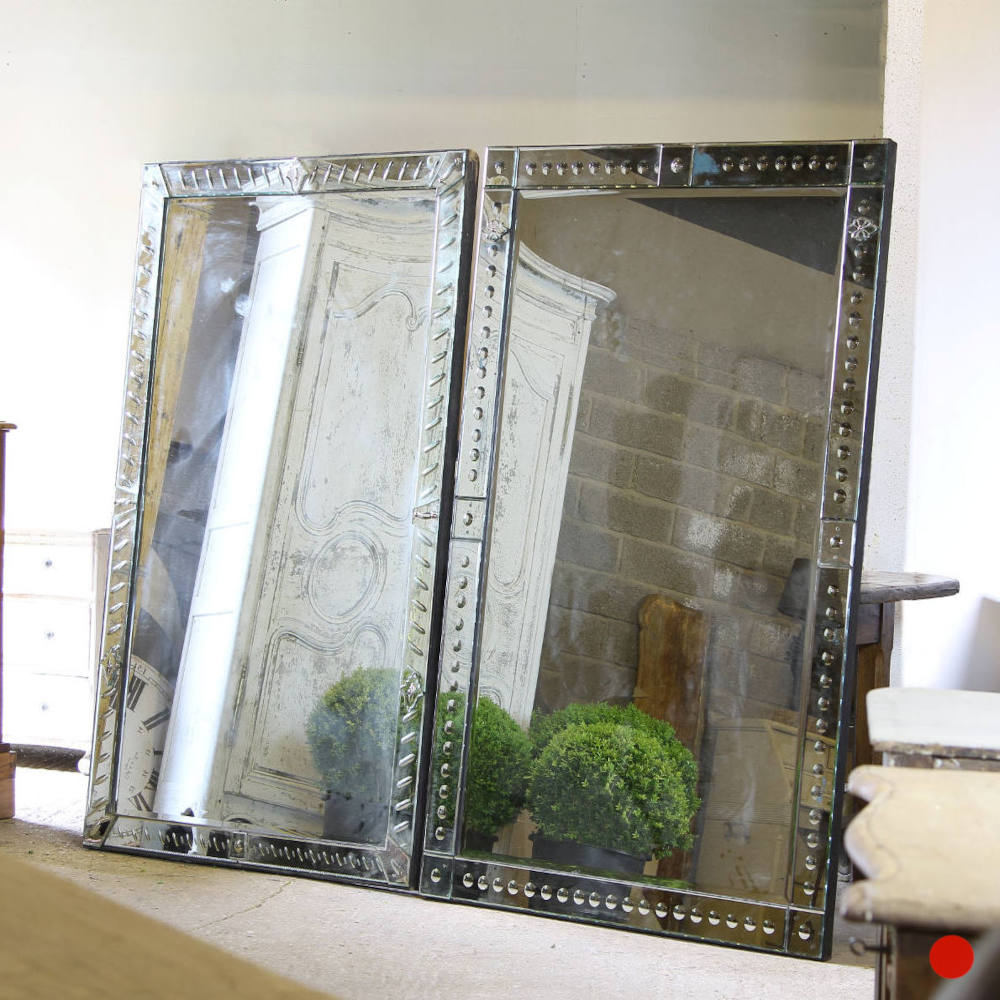 A pair of large Venetian mirrors