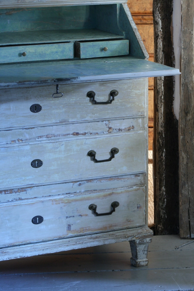 A close up view of a Swedish secretaire