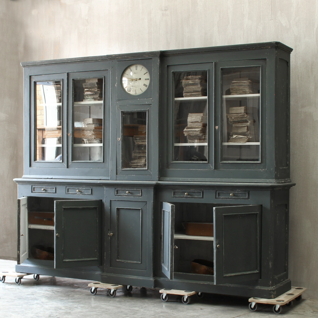 housekeepers cupboards with clock