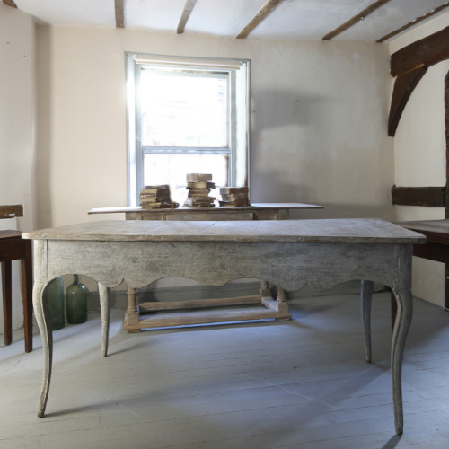 An early Swedish table with an elegant cabriole leg