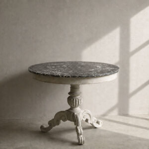 A decorative marble top French gueridon table with a painted base
